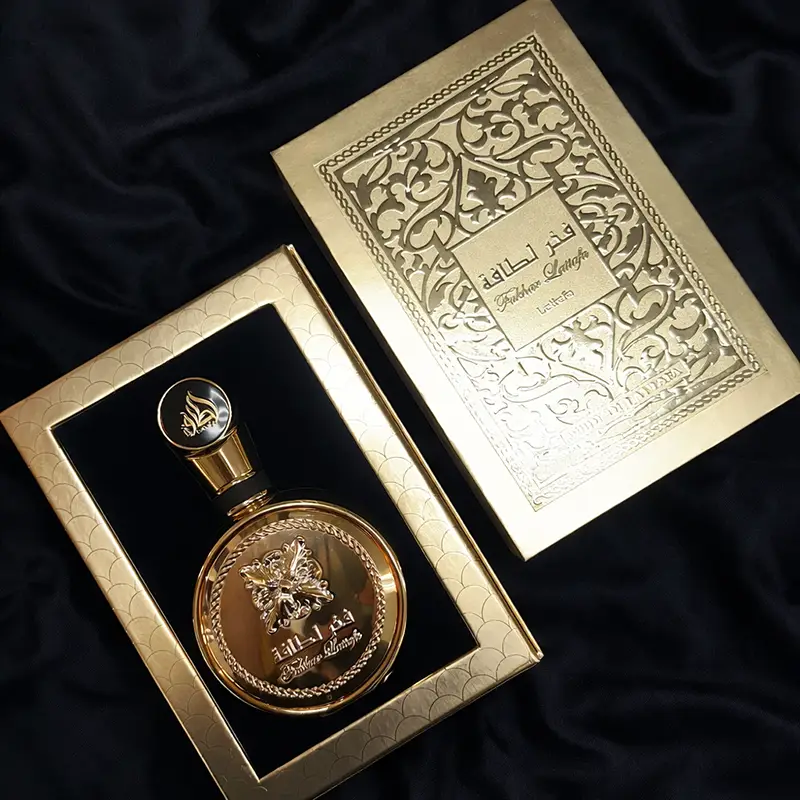 Unboxing experience of the Lattafa Fakhar Perfume Extrait Gold original set in its presentation box.