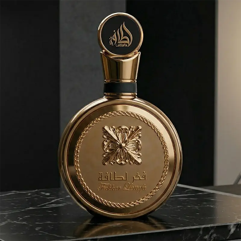 Main product shot of the Lattafa Fakhar Perfume Extrait Gold bottle on a neutral background.