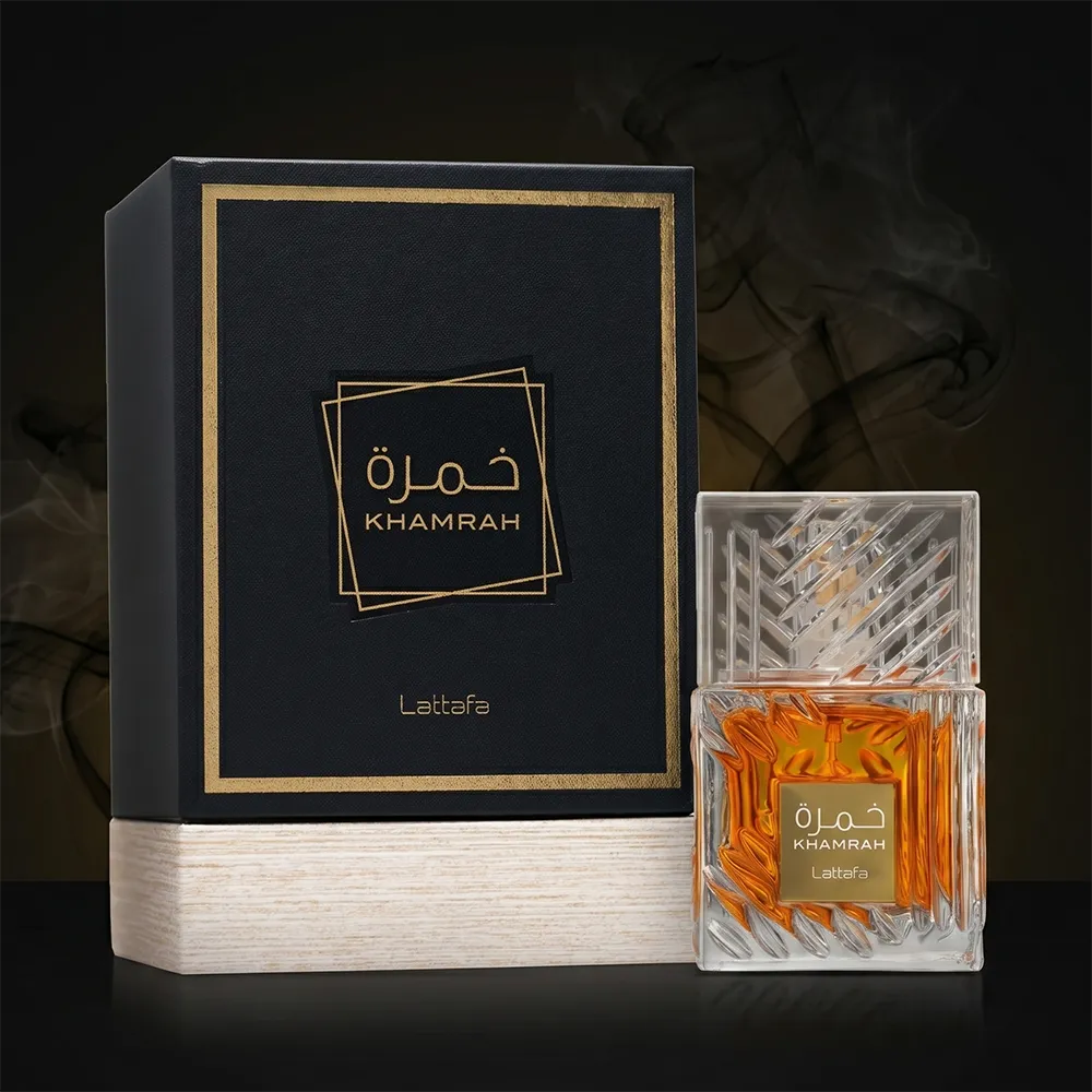 Lattafa Khamrah unisex fragrance collection showing the 100ml bottle alongside its authentic luxury gift box.