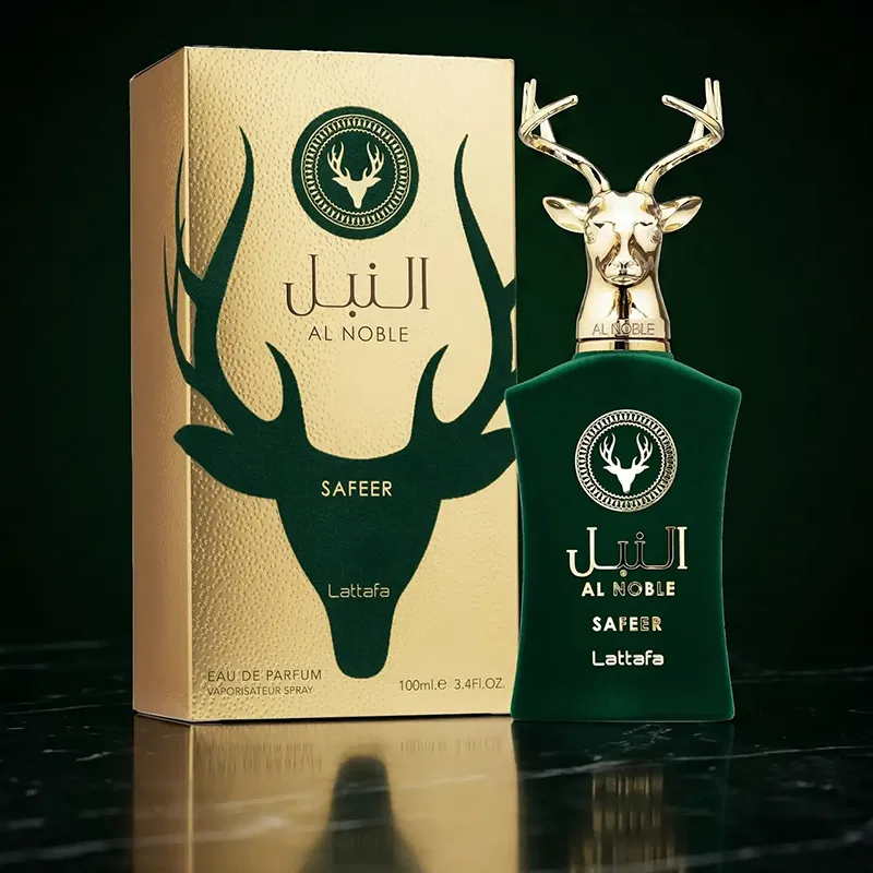 Studio shot of the deep green velvet fragrance bottle featuring a majestic gold stag head cap standing next to its retail box.
