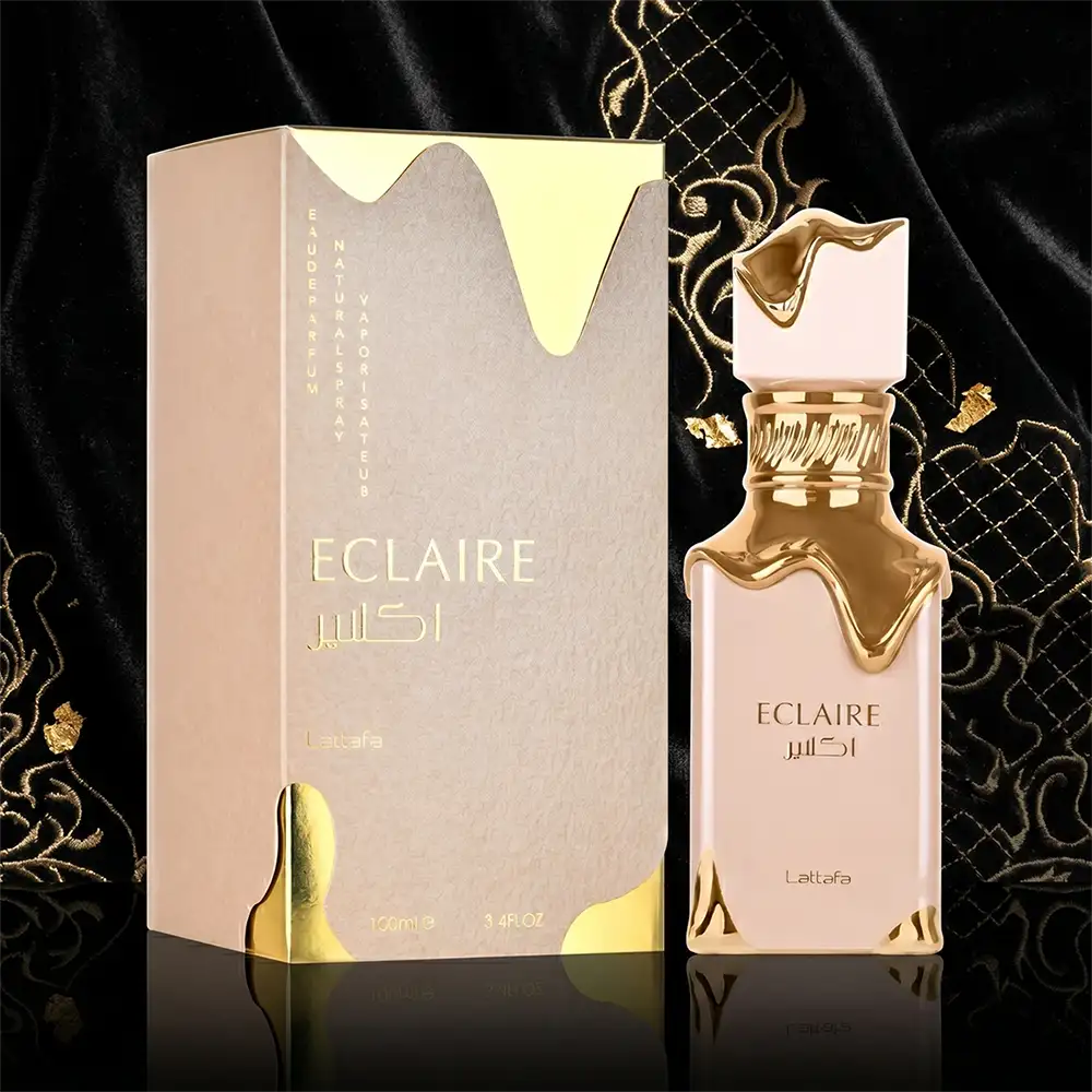 Lattafa Eclaire women perfume 100ml bottle and luxury packaging set on black velvet for a premium Arabic scent.