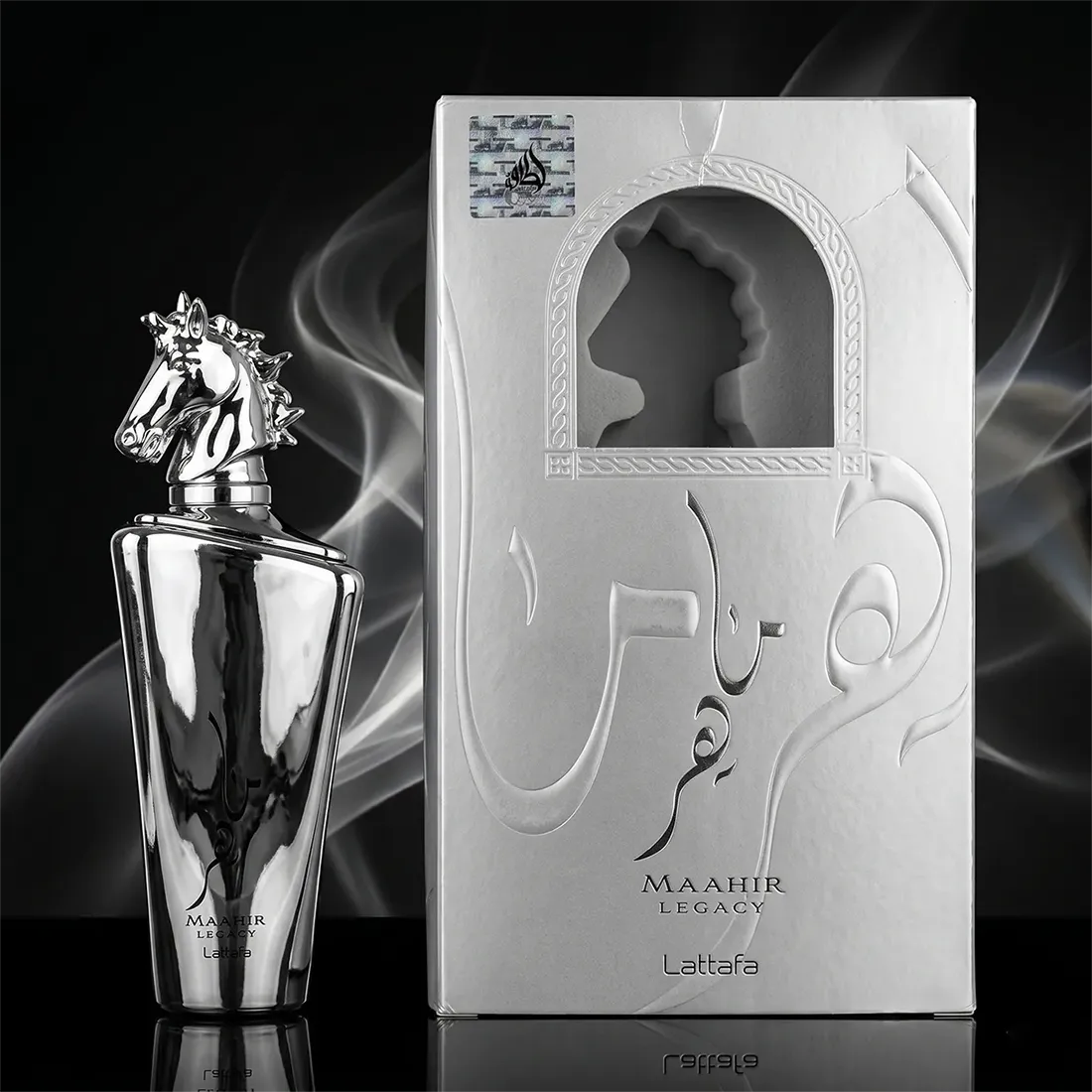 Lattafa Maahir Legacy for men hero presentation with silver horse bottle and white original perfume box.