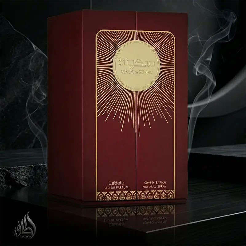 Front view of the premium Lattafa Sakeena luxury perfume box with gold sunburst logo.
